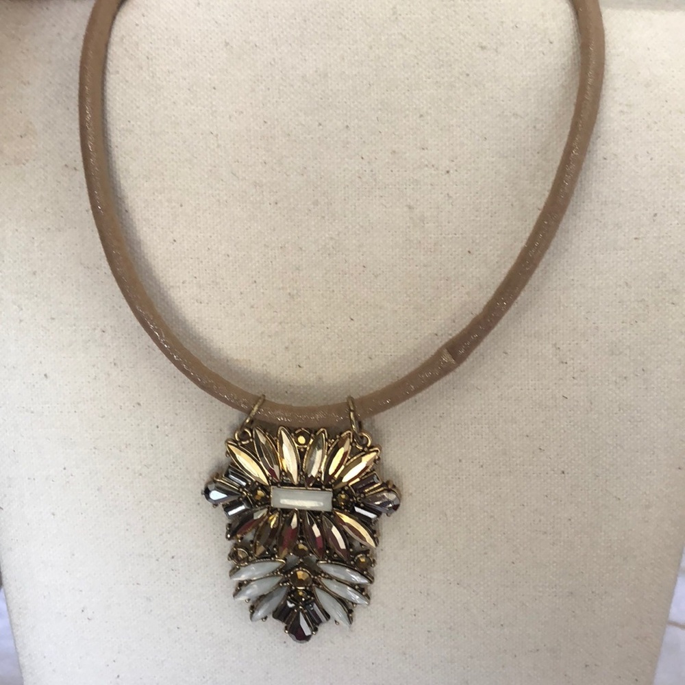 Gold colored necklace